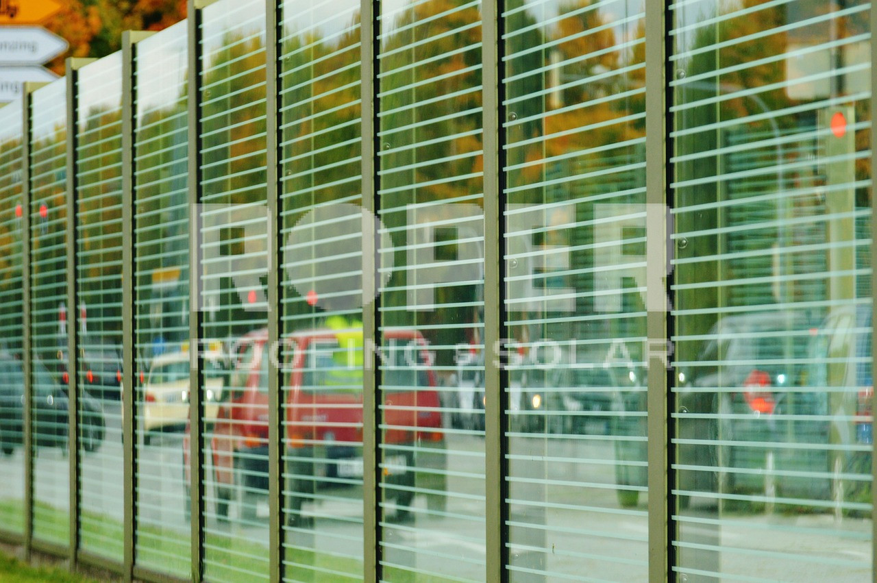Glass window blinds reflecting outdoor urban street scene with blurred buildings